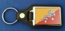 Bhutan Schlüsselanhänger aus Metall und Kunstleder | ca. 95 X 37  mm