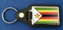 Simbabwe Schlüsselanhänger aus Metall und Kunstleder | ca. 95 X 37  mm